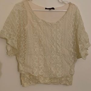 Cream lace blouse.